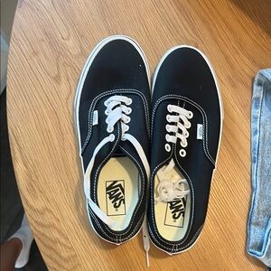 Vans Black and White Classic Slip-On Sneakers